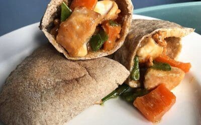 chicken and peanut salad in a pita